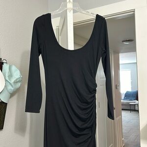 Long sleeved scoop neck black dress
